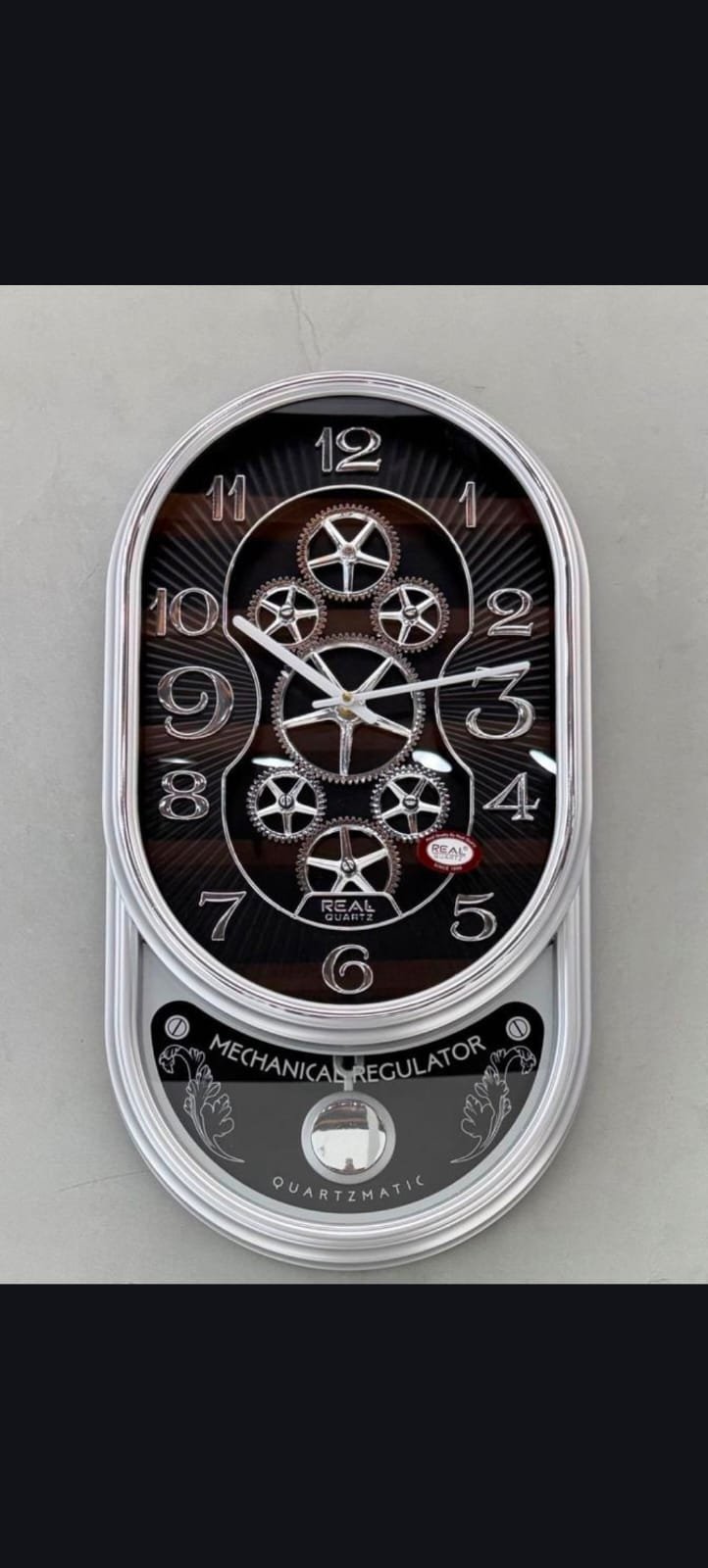 OVAL SHAPE GEAR WALL CLOCK